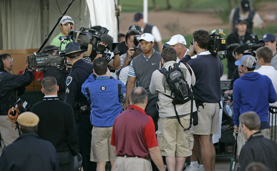 Tiger Woods walks through the crowd at the WGC Accenture Match Play Championships