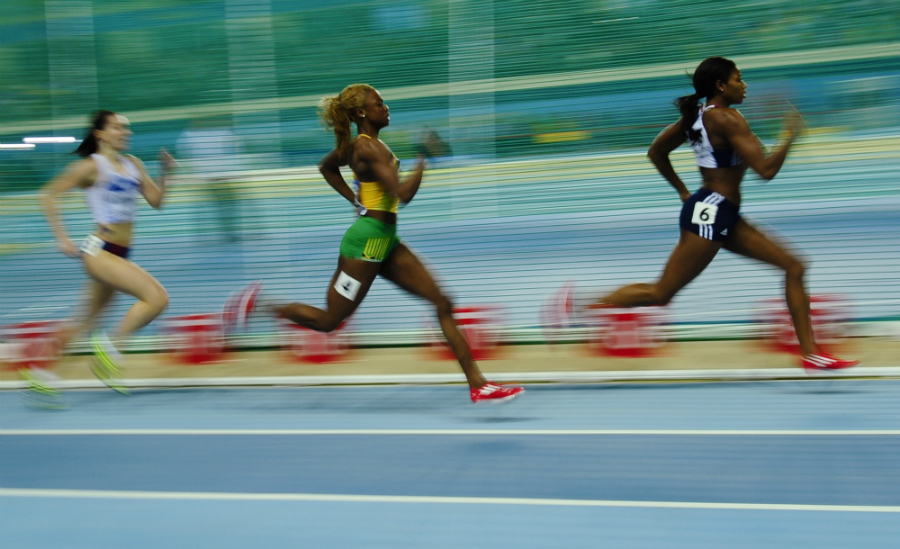 Shana Cox races ahead of Dominique Blake during the women's 400m semi-final