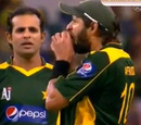 A screen grab of Shahid Afridi biting the ball