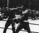 Joe Frazier hits Muhammad Ali