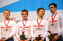 Gold medal winners Ed Clancy, Steven Burke, Owain Doull and Andy Tennant pose on the podium
