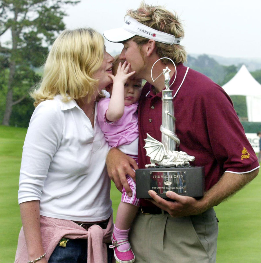 Ian Poulter celebrates with wife Katie and daughter Aimee-Leigh