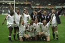 The England team celebrate their victory