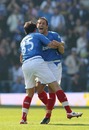 Michael Brown is congratulated after scoring Portsmouth's opening goal against Aston Villa