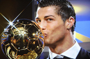 Cristiano Ronaldo kisses his Ballon d'Or trophy