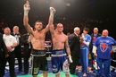 Carl Froch holds up George Groves' arm after their fight