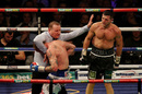 Carl Froch looks on as the referee stops the fight