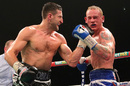 Carl Froch lands a left uppercut on George Groves