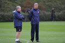 Arsene Wenger and Pat Rice hold a training session