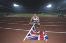 Roger Black posing for photographers after the 4x400 Metres Relay event during the 1996 Olympic Games