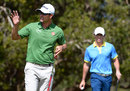 Adam Scott and Rory McIlroy will head into the final round of the Australian Open separated by four shots