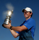 Rory McIlroy holds the trophy aloft