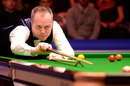John Higgins was beaten by Stephen Maguire in the last 16 of the UK Championship