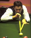 Ronnie O'Sullivan lines up a red