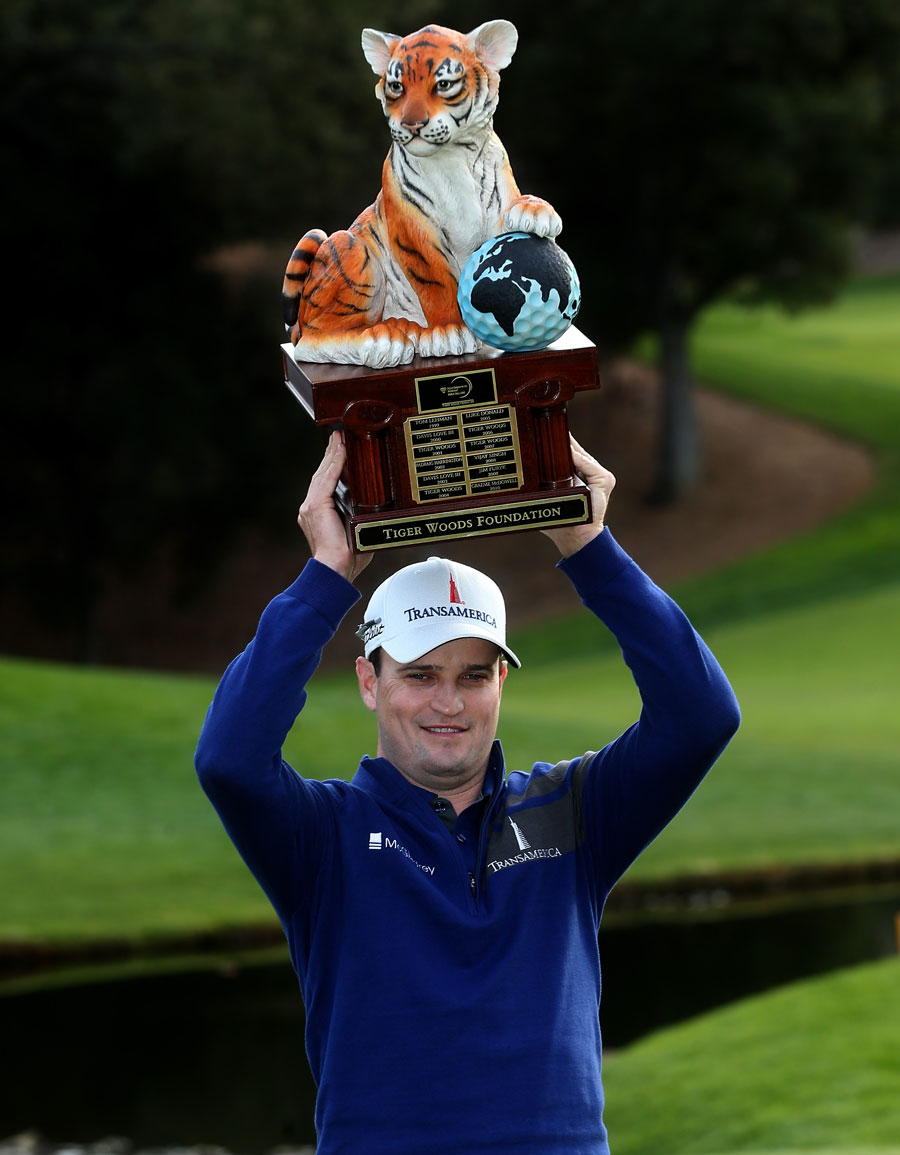 Zach Johnson shows off his latest trophy