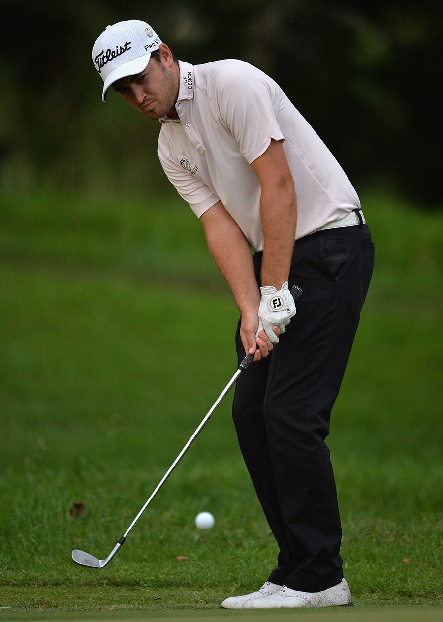 Daniel Brooks plays a shot during the first round