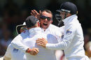 Graeme Swann celebrates the wicket of David Warner
