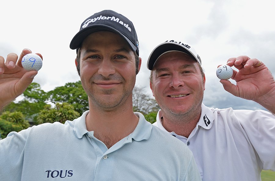 Jorge Campillo and Colin Nel pose for the cameras after both carding historic rounds of 59 in South Africa