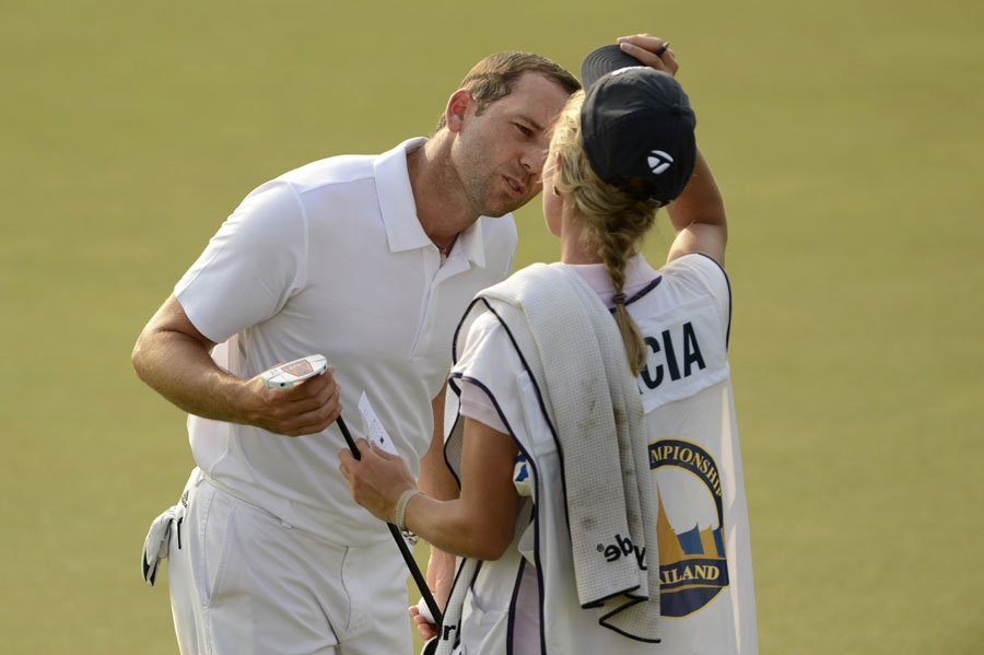 Sergio Garcia leans in for a kiss with girlfriend and caddie Katharina Boehm