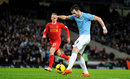 Alvaro Negredo hits a shot that Simon Mignolet is unable to stop as Manchester City take the lead against Liverpool