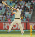Chris Rogers goes airborne to attack