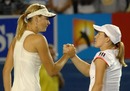 Justine Henin congratulates Maria Sharapova