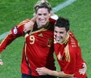 Fernando Torres and David Villa celebrate the Liverpool man's strike