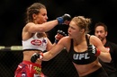 Miesha Tate and Ronda Rousey exchange punches