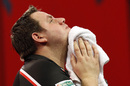 Adrian Lewis contemplates his semi-final defeat to Michael van Gerwen