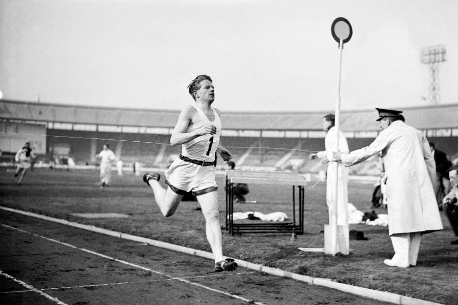 Oxford University's Chris Chataway breaks the tape to win the mile