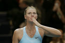 Maria Sharapova blows a kiss to the crowd after cruising into the semi-finals
