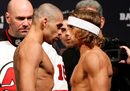 Renan Barao and Urijah Faber face off during the UFC 169 weigh-in