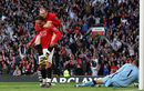 Wayne Rooney celebrates Dimitar Berbatov's goal