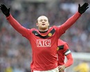 Wayne Rooney celebrates scoring his team's second goal