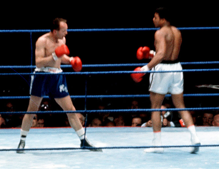 Henry Cooper and Muhammad Ali during their fight at Highbury in 1966