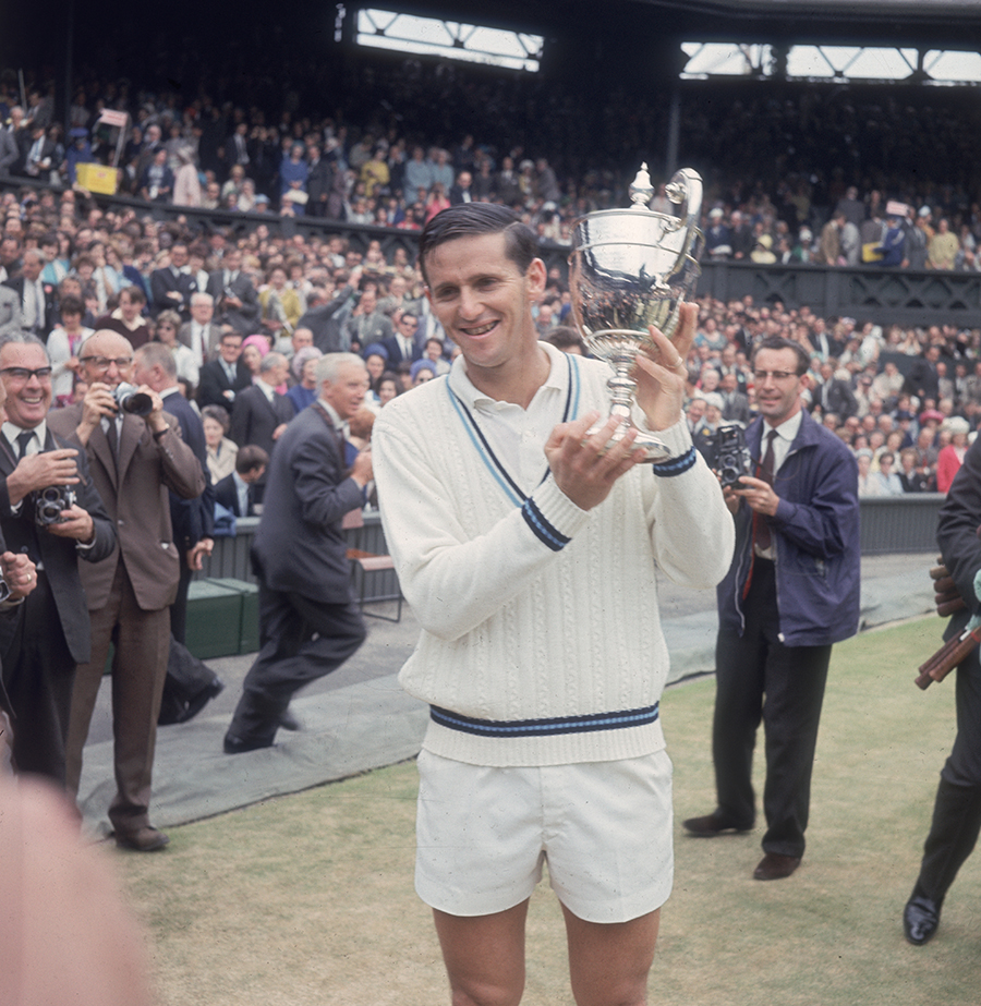 Australian tennis player Roy Emerson with the men's singles trophy after beating compatriot Fred Stolle in the Wimbledon final
