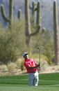 Graeme McDowell plays his third shot on the second hole during the second round