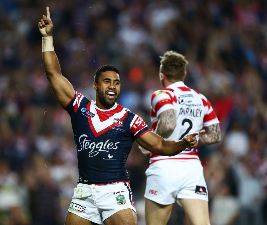 Michael Jennings celebrates scoring a try in the World Club Challenge match between Sydney Roosters and Wigan Warriors