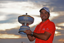 Jason Day poses with the Walter Hagen Cup after defeating Victor Dubuisson of France on the 23rd hole