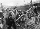 The Tartan Army invade the pitch and pull down the goalposts after Scotland beat England 2-1