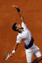 Novak Djokovic serves to Thomaz Bellucci