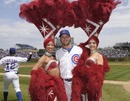 Showgirls pose with Chicago Cubs' James Russell 