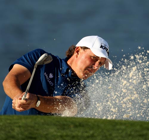 Phil Mickelson plays out of the sand