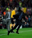 Jose Mourinho runs onto the pitch