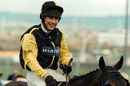Carl Llewellyn celebrates on board Earth Summit after winning the Grand National
