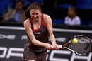 Anna Lapushchenkova steps into a backhand