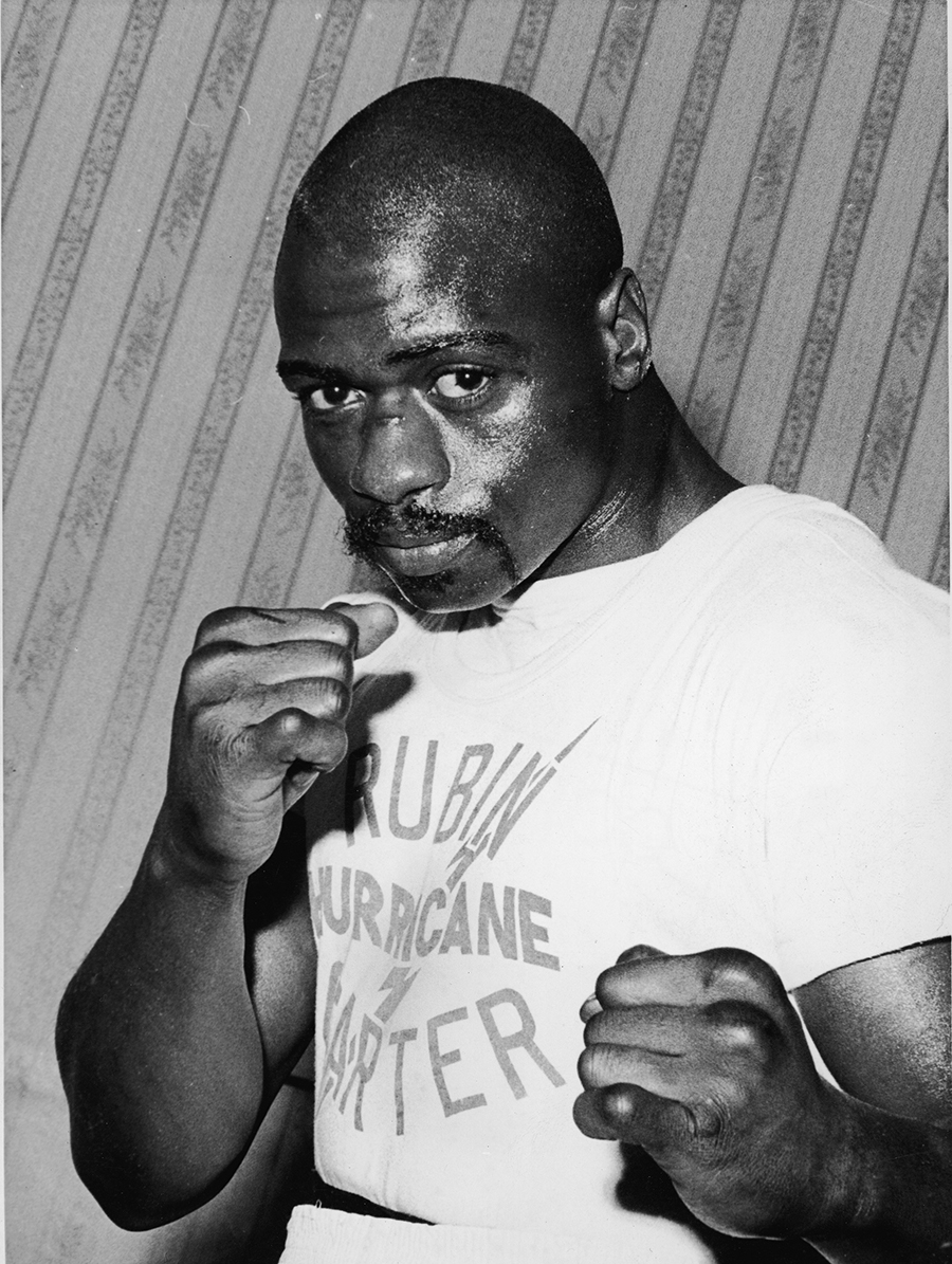 Rubin 'Hurricane' Carter in a fighter's pose at Butcher's Arms, his training headquarters for his upcoming fight against Harry Scott
