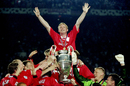 David May celebrates with team-mates after their dramatic 2-1 victory over Bayern Munich in the Champions League final