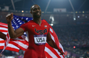 Tyson Gay celebrates winning silver in the men's 4x100m relay final