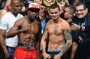 Floyd Mayweather Jr and Marcos Maidana pose for the cameras